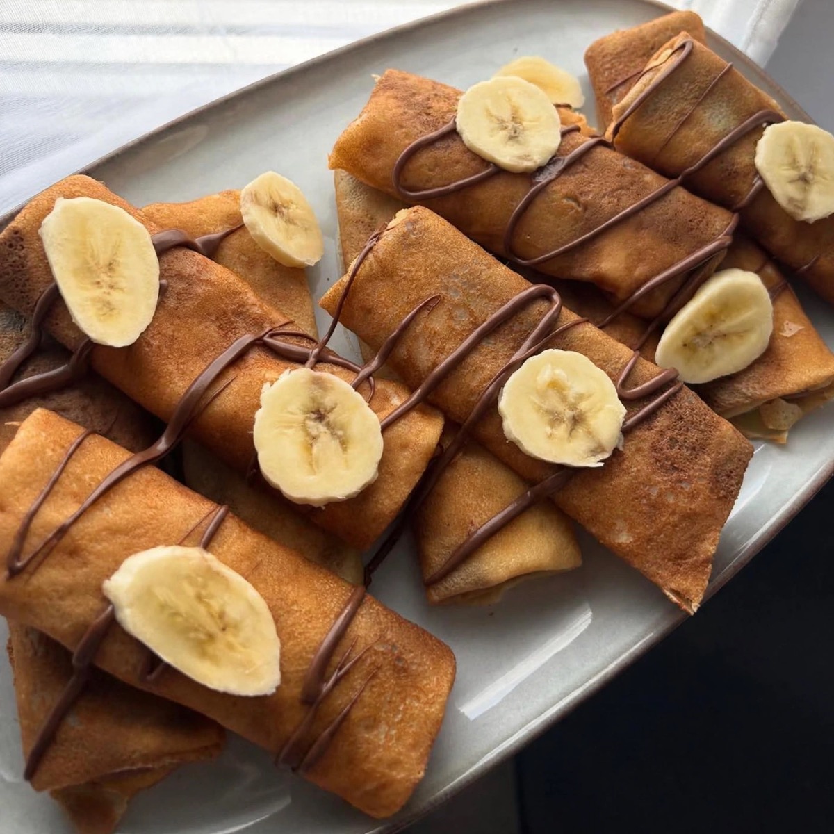 Photo de Recette Crêpes roulées, Banane & Chocolat